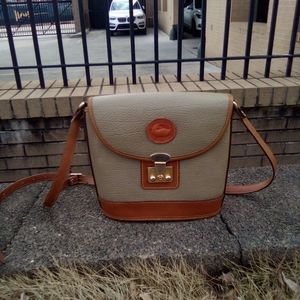 Dooney and Bourke across the shoulder putae